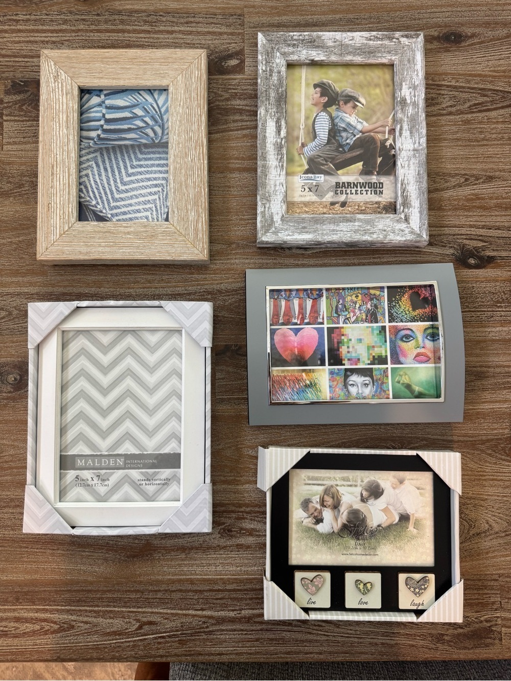 Picture frames . Five brand new multicolored frames.